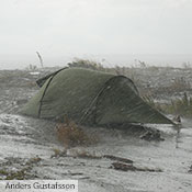 Our Black Label tents are designed not only to offer full adaptability to and ease of handling in both fine and foul conditions, but also to maximize durability. Here a 30 year old Nammatj stands strong against some truly ugly conditions.