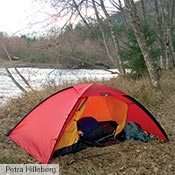 An Unna on a river bank in Washington. One corner of the inner tent unhooked to create a virtual vestibule.